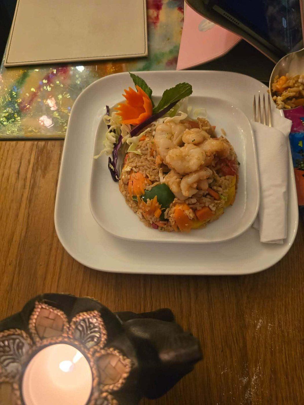 Prawn fried rice with carved carrot garnish — Tookta's